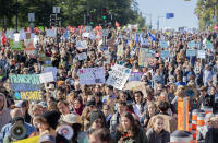 People take part in a climate change march in Montreal, Friday, Sept. 23, 2022. (Graham Hughes/The Canadian Press via AP)