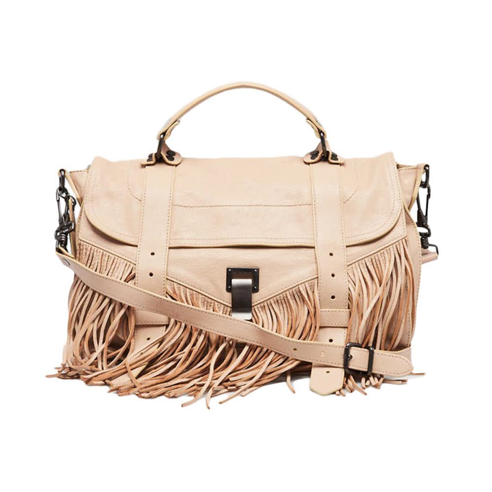 <p><a href="https://www.yoogiscloset.com/576493-proenza-schouler-beige-leather-fringe-ps1-medium-satchel-bag.html" rel="nofollow noopener" target="_blank" data-ylk="slk:Shop Now;elm:context_link;itc:0;sec:content-canvas" class="link rapid-noclick-resp">Shop Now</a></p><p>Beige Leather Fringe PS1 Medium Satchel Bag</p><p>yoogiscloset.com</p><p>$395.00</p>