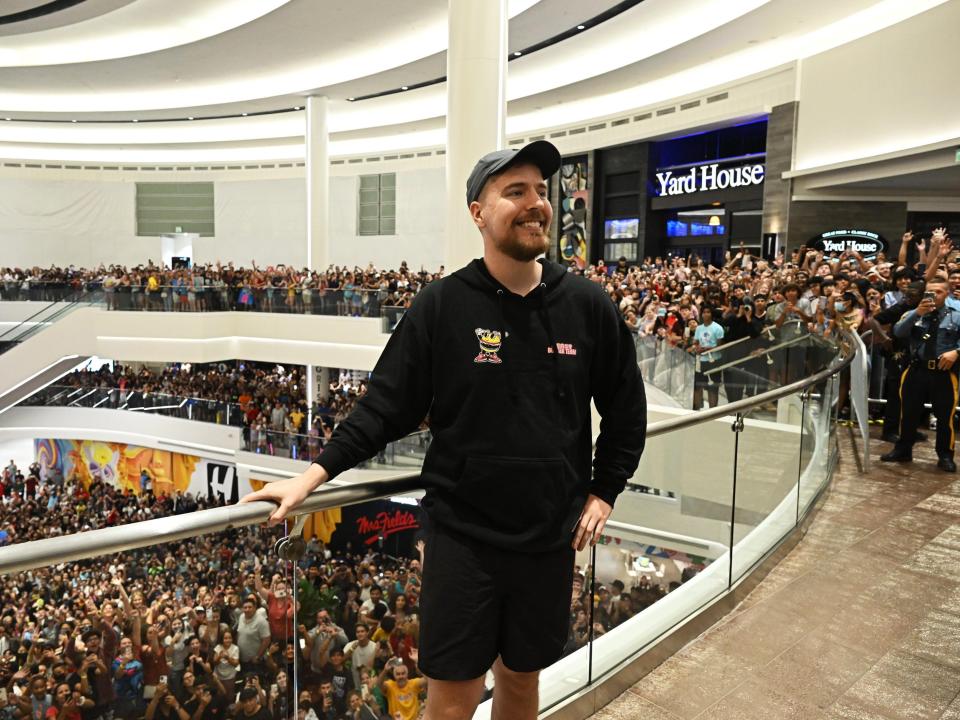 MrBeast with throngs of fans at a shopping mall