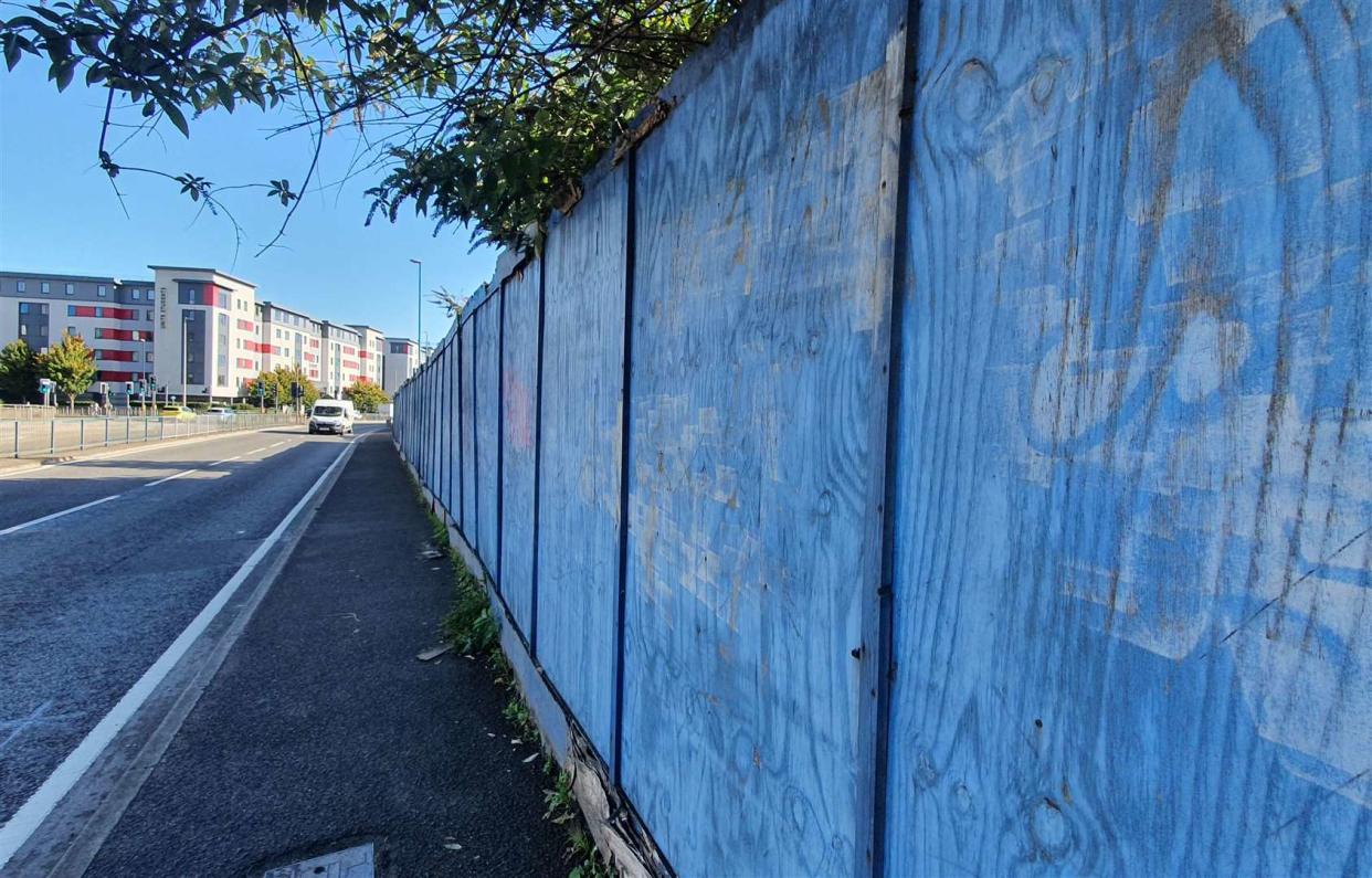 This 'temporary' fence costing the council £75 a week is finally coming down - 14 years after it was erected. (SWNS)