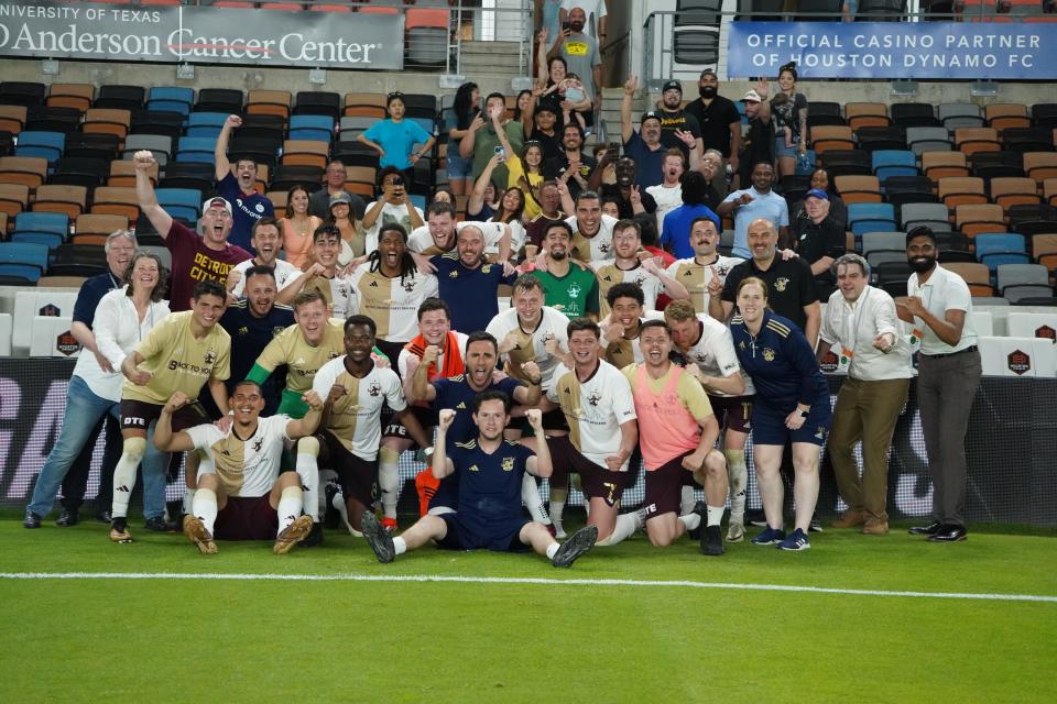 Detroit City FC players celebrate following their U.S. Open Cup victory over the Houston Dynamo in the Round of 32 on Tuesday, May 7, 2024, in Houston.