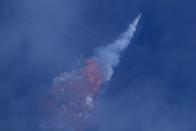 A SpaceX Falcon 9 rocket engine self-destructs after jettisoning the Crew Dragon astronaut capsule during an in-flight abort test after lift of from the Kennedy Space Center in Cape Canaveral