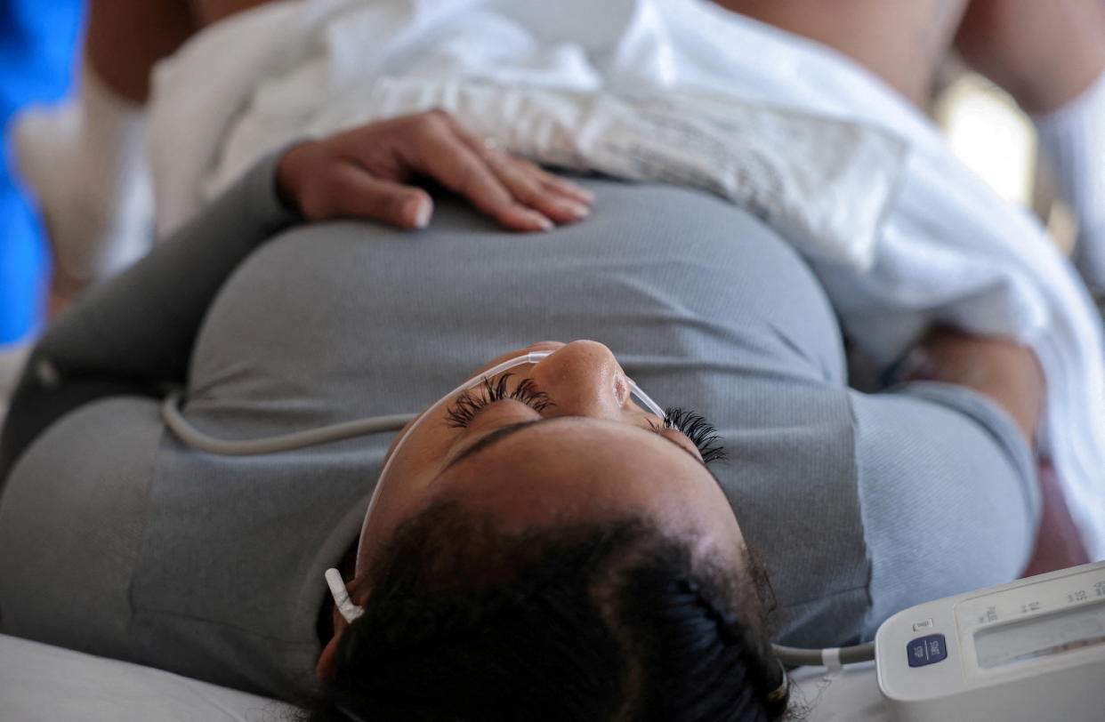 A patient lies on her back at an abortion clinic.