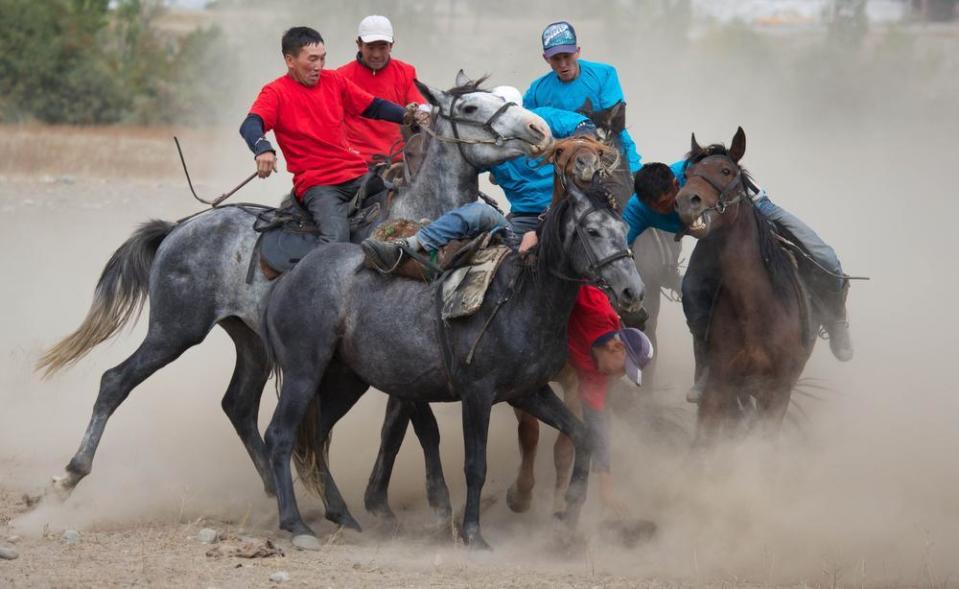 Playing buzkashi. The village of Bystrovka in the Chon Kemin valley, Kyrgyzstan.