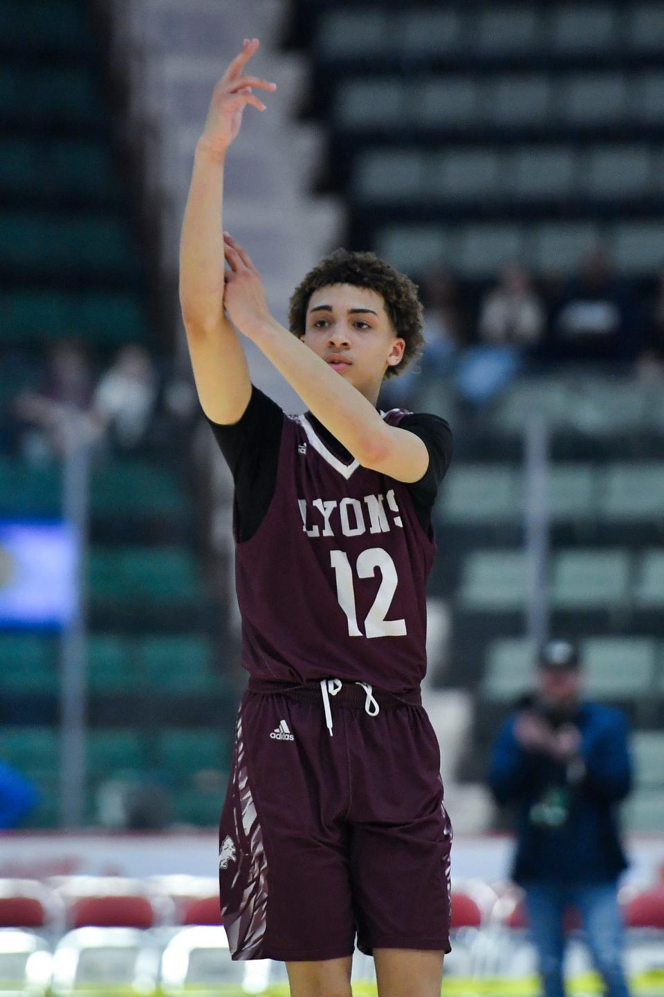 Lyons’ Dezmen Bell reacts after scoring during a NYSPHSAA Class C Boys Basketball Championships semifinal in Glens Falls, N.Y., Friday, March 15, 2024. Lyons’ season ended with a 56-45 loss to Moravia-IV.