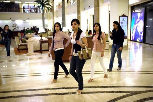 Shoppers at the Emporio shopping mall in New Delhi. India's consumer spending is at its weakest in seven years, global ratings agency Fitch said on Tuesday, as it cut the outlook for India's vast retail sector from stable to negative