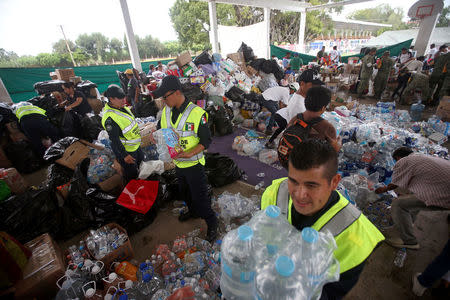 Soldiers organise donations at a shelter set up by the army after an earthquake, in Jojutla de Juarez, Mexico September 21, 2017. REUTERS/Edgard Garrido