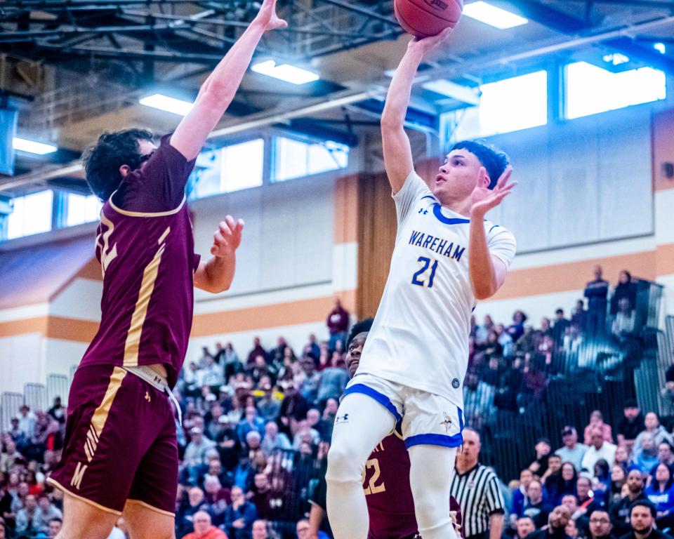 Wareham's Diego Mello drives to the basket.