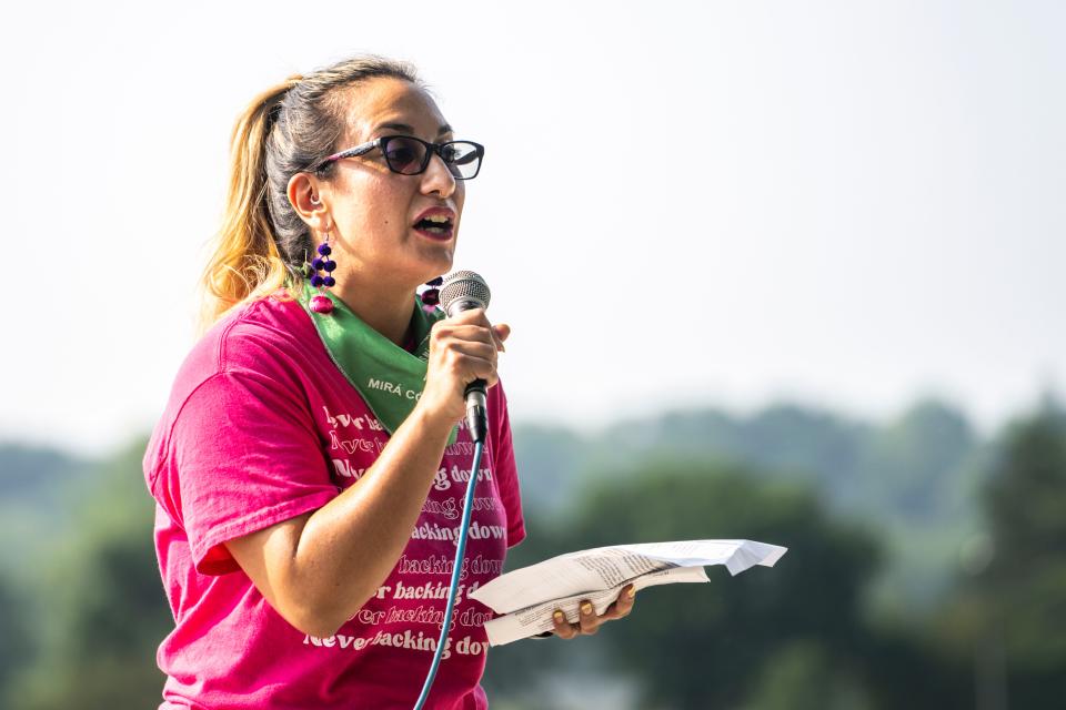 Gabriela Fuentes, Planned Parenthood North Central States senior advocacy strategist, speaks during a celebration rally at the Des Moines Biergarten at Water Works Park on Friday.
