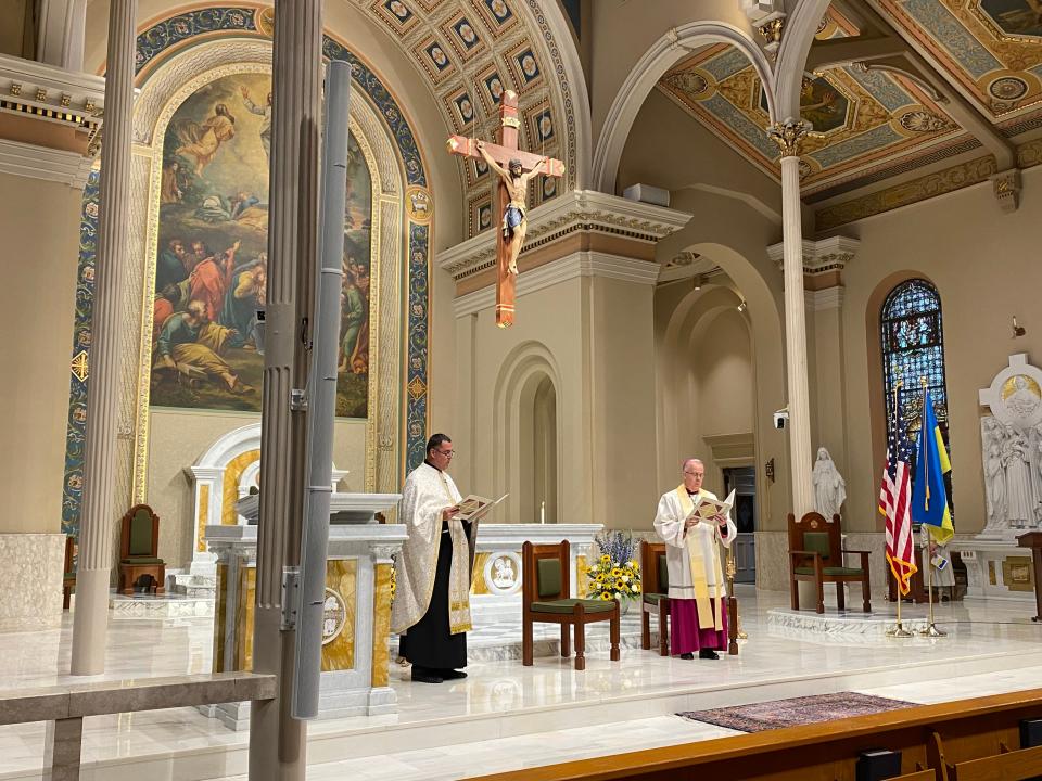 Father Myron Myronyuk and Bishop Joseph C. Bambera begin the prayer service for an end to the war in Ukraine at the Cathedral of Saint Peter in Scranton on Sunday, Sept. 25.