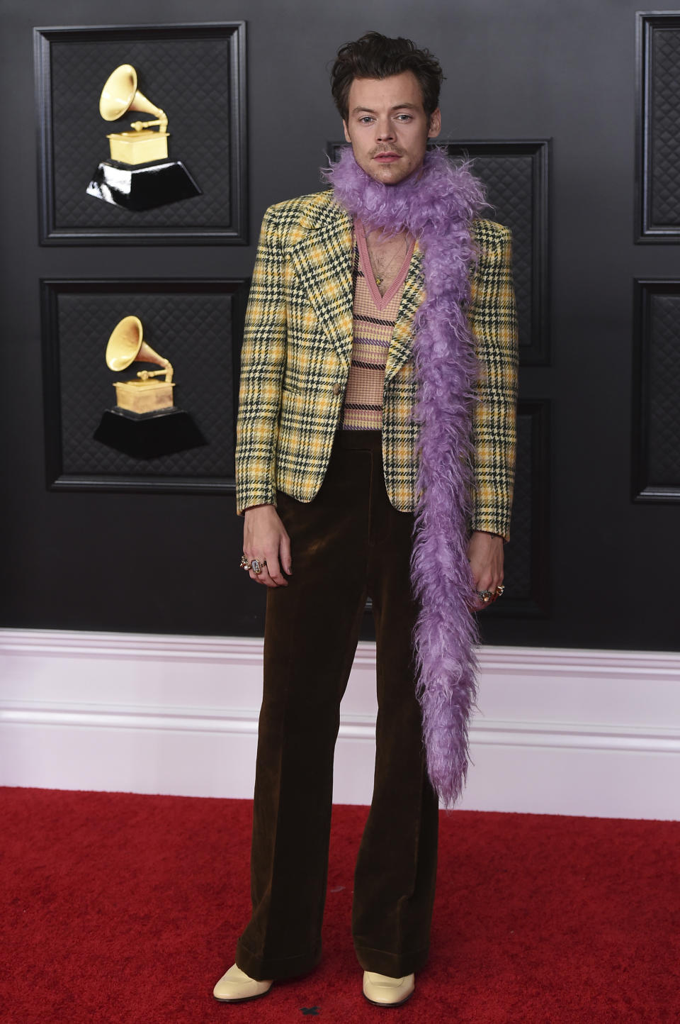 FILE - Harry Styles poses in the press room at the 63rd annual Grammy Awards on March 14, 2021. Styles turns 28 on Feb. 1. (Photo by Jordan Strauss/Invision/AP, File)