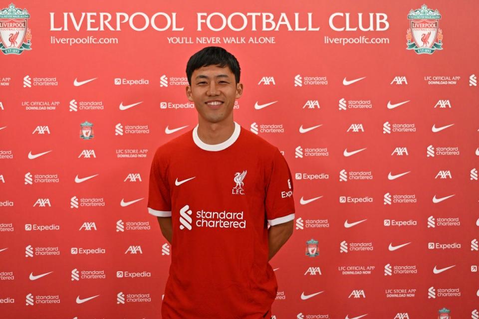 Done deal: Japan midfielder Wataru Endo has become Liverpool’s third summer signing (Liverpool FC via Getty Images)