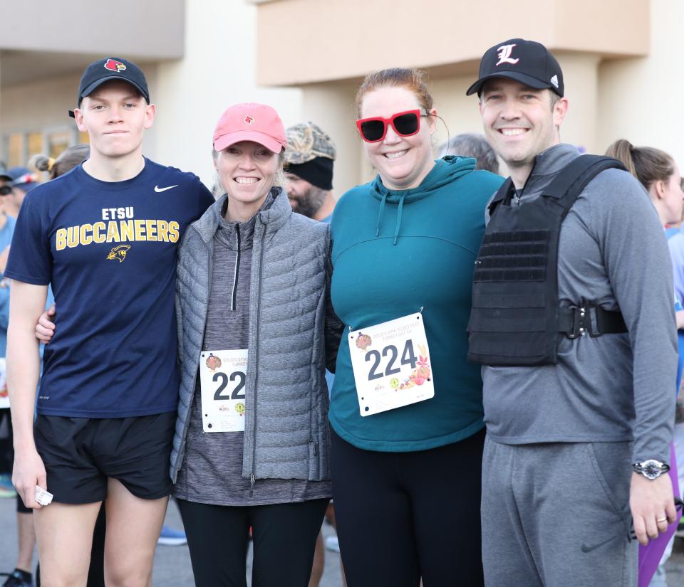 Ben Greer, Brooke Greer, Jenn Porter, and Josh Porter participated in the 18th Annual Turkey Day 5K sponsored by Gold's Gym and Fleet Feet on Thursday, November 24, 2022, in Jackson, Tennessee.  Over 600 runners participate in the event each year which is held to benefit the Regional Inter-faith Association (RIFA).