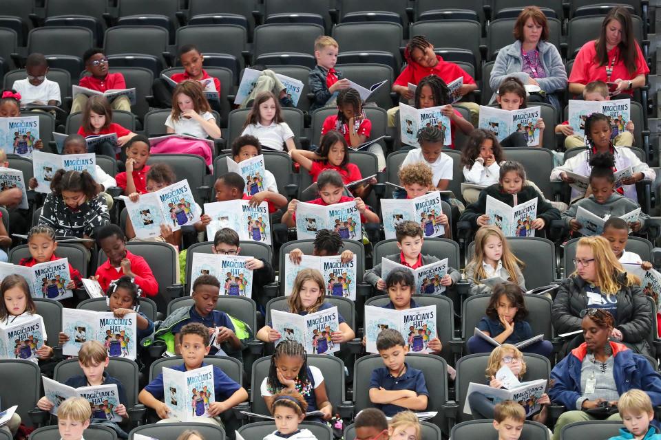 Savannah Chatham County Public Schools 2nd graders read copies of their new books “The Magician’s Hat" by former University of Georgia and New England Patriots wide receiver Malcolm Mitchell on Tuesday, October 17, 2023 during a Reading Rally at Enmarket Arena.