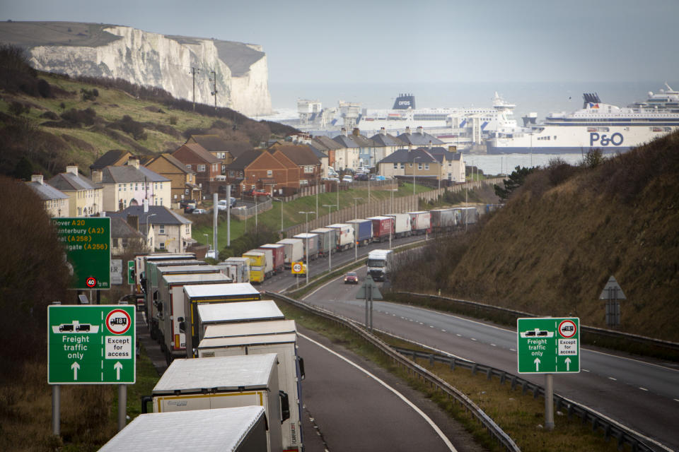 Lorries line up on the M20 motorway to use the BREXIT Dover Tap contraflow system into the Eastern Dock of the Port of Dover where the cross channel port is situated with ferries departing here to go to Calais in France on the 18th December 2020, Dover, Kent, United Kingdom. Photo: Andrew Aitchison / In pictures via Getty Images