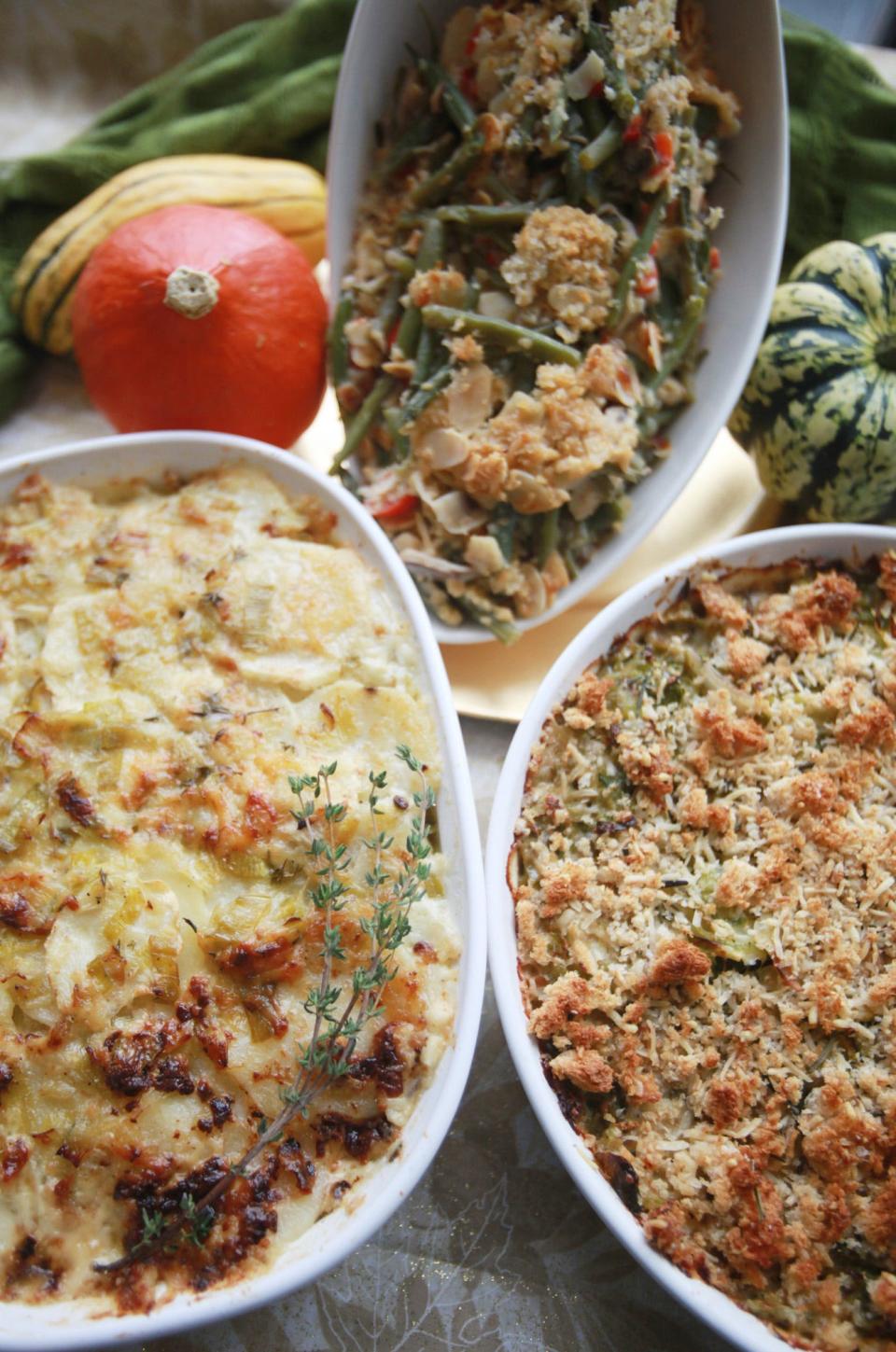 Thanksgiving is a holiday of side dishes. Among them are Potato and Celery Root Gratin with Leeks, from left, Green Bean Gratin, and Pan Roasted Brussel Sprout Gratin with Shallots and Rosemary.