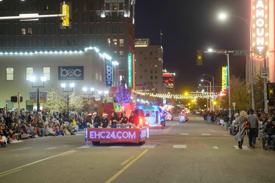 Crowds lined the sidewalks of Polk Street  Friday night to view the Center City Electric Light Parade in downtown Amarillo.