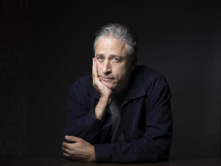 FILE - In this Nov. 7, 2014 file photo, Jon Stewart poses for a portrait in New York. Stewart directed the comedy "Irresistible," starring Rose Byrne and fellow "The Daily Show with Jon Stewart" alum, Steve Carell. (Photo by Victoria Will/Invision/AP, File)