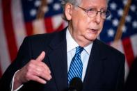 Senate Majority Leader Mitch McConnell (R-KY) speaks to reporters after the Senate Republican luncheon on Capitol Hill