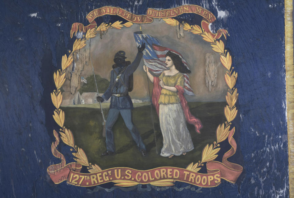 This undated photo provided by Morphy Auctions shows a 127th Regiment United States Colored Troops battle flag in Denver, Pa. The flag was carried into battle by one of the 11 black Union regiments during the Civil War, and is going up for auction in Pennsylvania. The flag was painted by David Bustill Bowser, an African American artist who was a member of one of the regiments and the son of a fugitive slave. (Morphy Auctions via AP)