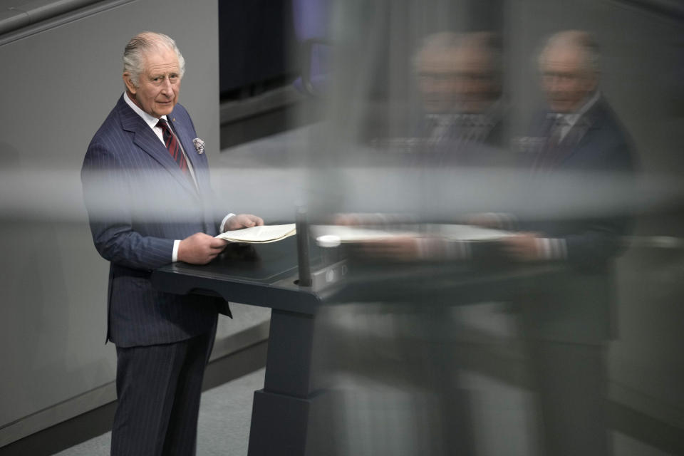 FILE - Britain's King Charles III addresses the Bundestag, Germany's Parliament, in Berlin, Thursday, March 30, 2023. A year after the death of Queen Elizabeth II triggered questions about the future of the British monarchy, King Charles III’s reign has been marked more by continuity than transformation, by changes in style rather than substance. (AP Photo/Markus Schreiber, File)