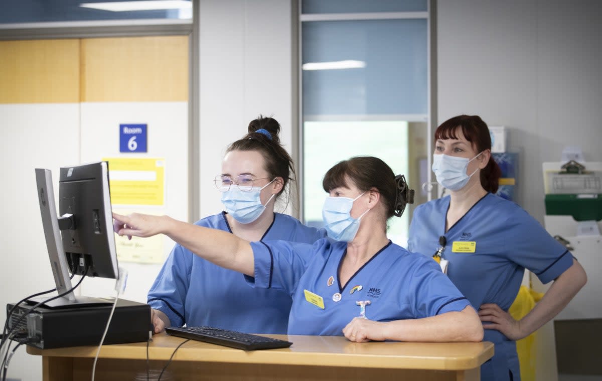 NHS working in a hospital (Stock image)  (PA Wire)