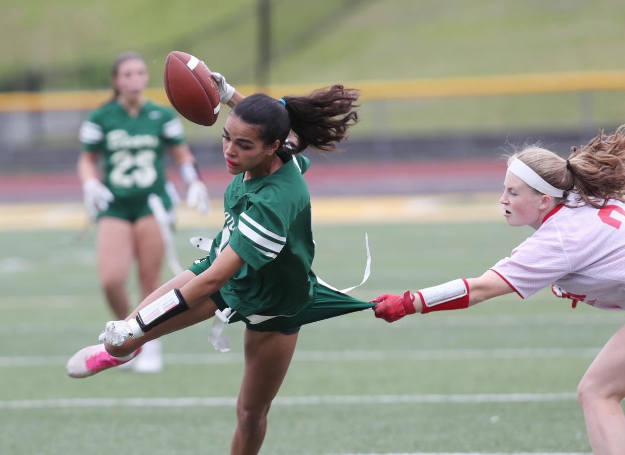 Brewster's Sienna Santiago (11) breaks away from Tappan ZeeÕs Eve Gerardi (3) during the flag football Section 1 championship at Lakeland High School in Shrub Oak May 18, 2024. Brewster won the game 24-13.