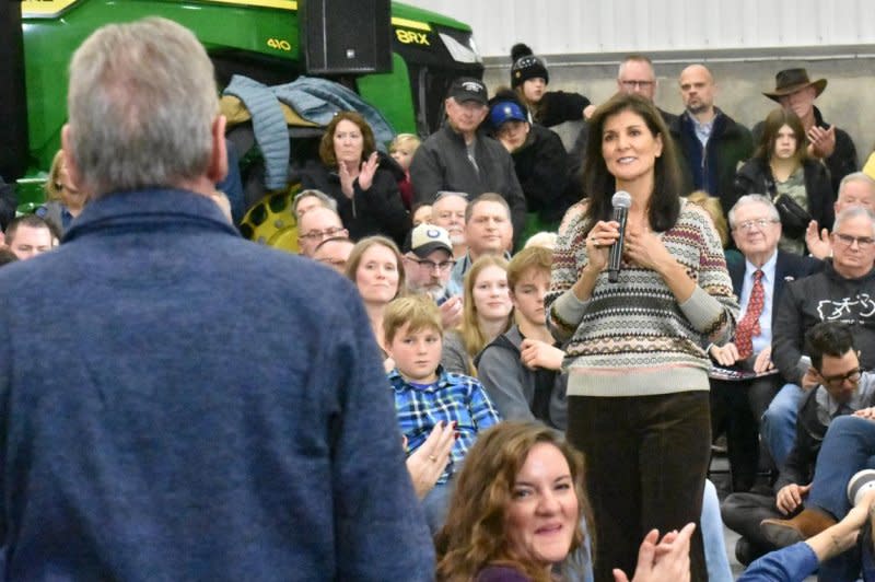 Republican presidential candidate Nikki Haley listens to a question from John Winter of Boone, Iowa, during a town hall in rural Waukee, Iowa, on Sunday. Photo by Joe Fisher/UPI