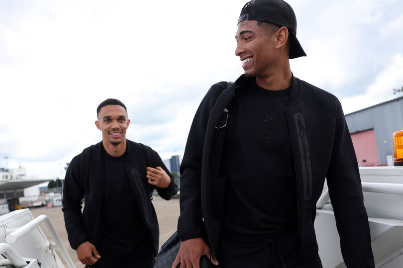 Liverpool defender Trent Alexander-Arnold and Real Madrid midfielder Jude Bellingham board the plane as the England team travel to Germany ahead of their Euro 2024 campaign