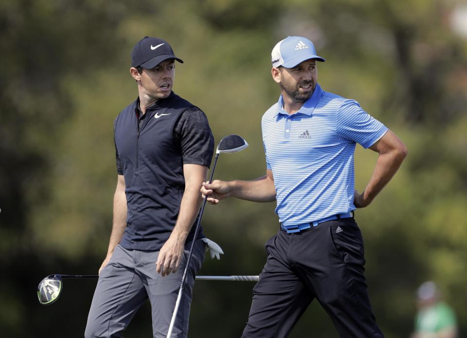 Rory McIlroy, of Northern Ireland, left, and Sergio Garcia, of Spain, walk off the 16th tee during a practice round for the Dell Match Play Championship golf tournament at Austin County Club, Tuesday, March 21, 2017, in Austin, Texas. (AP Photo/Eric Gay)Rory