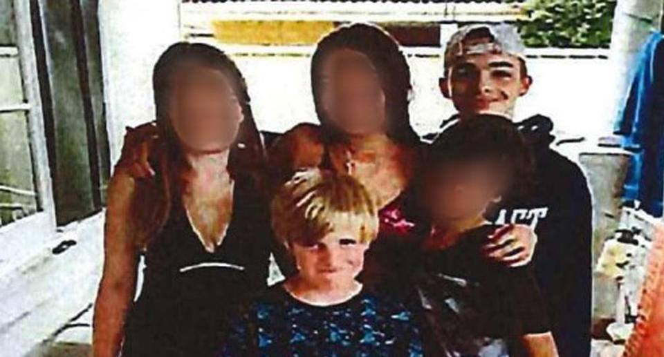 Perth boys Declan (second left) with blonde hair and Tyrell (far right) pictured in a photo with three others.  