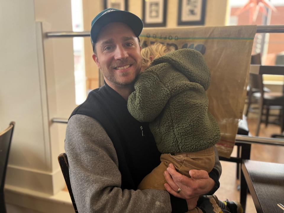 Dean Henderson with son, James, 3.