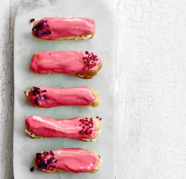 <p>This beautiful pink éclair recipe couples fresh raspberries with both a pastry cream and glaze flavoured with raspberry purée. A hint of rose is present in both the rosewater in the pastry cream and the dried rose petals sprinkled on top.Raspberries and rose share volatile flavour compounds in common – so they are an excellent flavour match. </p><p><a class="link " href="https://www.redonline.co.uk/food/recipes/a32778447/raspberry-rose-eclairs/" rel="nofollow noopener" target="_blank" data-ylk="slk:RECIPE HERE;elm:context_link;itc:0;sec:content-canvas">RECIPE HERE</a></p>