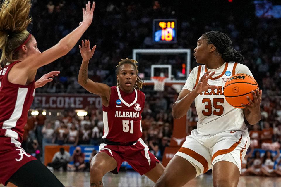 Texas' Madison Booker looks for a teammate during an NCAA Tournament game against Alabama on March 23 at Moody Center. The two teams will have a rematch this coming season when they meet as SEC programs in Austin again.