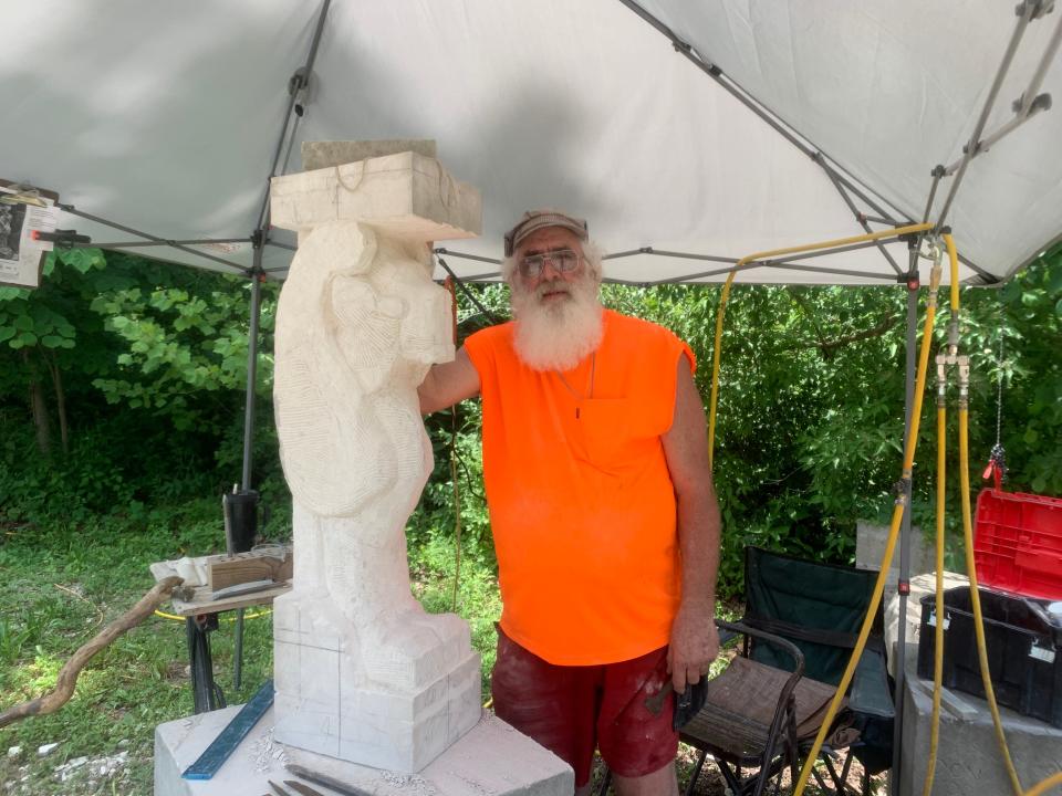 Gary Bennett poses with his architectural work at the Indiana Limestone Symposium on June 16, 2022.