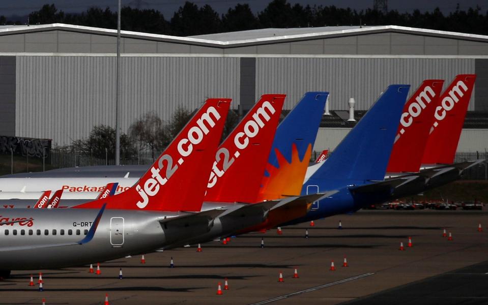 Jet2 planes are seen parked at Birmingham airport as coronavirus spread - Reuters