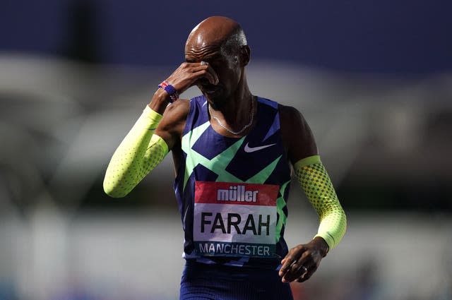 Great Britain’s Sir Mo Farah reacts after failing to achieve the qualifying time in the men’s 10000m final in Manchester