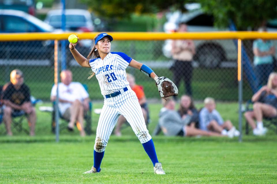 Clear Creek Amana outfielder Bailey Olerich, shown fielding a ball during 2020 game, will stay near home and play for the Iowa Hawkeyes next season.