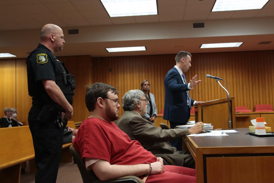 Craig Frederick, grandson of Glen Harold Meyers, gestures Friday while addressing Lenawee County Circuit Judge Anna Marie Anzalone during Alarik John Guajardo's sentencing for murdering Meyers in the Adrian Meijer store on Sept. 16, 2020. Also pictured are, from left, Detective Kevin Greca of the Lenawee County Sheriff's Office; Guajardo; Guajardo's attorney, Lenawee County Chief Public Defender John Glaser; and Lenawee County Chief Assistant Prosecutor Jackie Wyse.