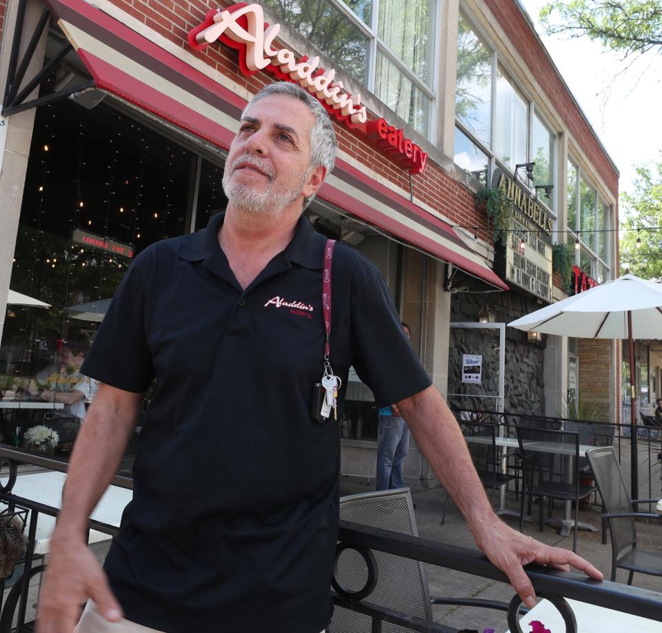 Marwan Lahham owner of the Aladdin's Eatery in Highland Square talks about staffing issues and getting workers outside of his restaurant in Akron on Wednesday June 9, 2021.