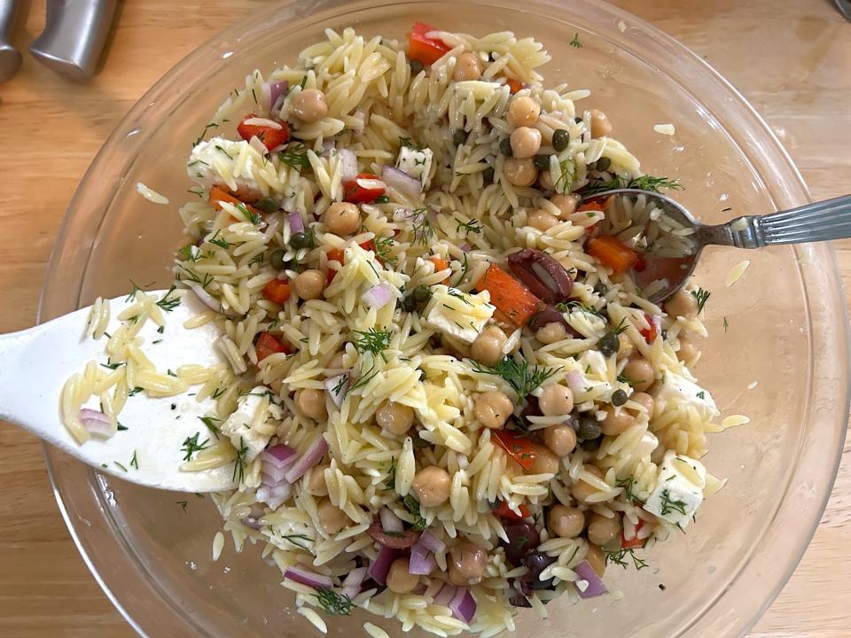 Mixing Ina Garten's Greek Orzo Salad