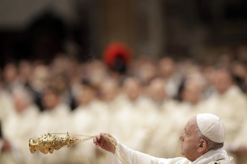 Pope Francis asperges incense during a ceremony in which he ordained nineteen new priests in St. Peter's Basilica at the Vatican, Sunday, May 12, 2019. (AP Photo/Alessandra Tarantino)