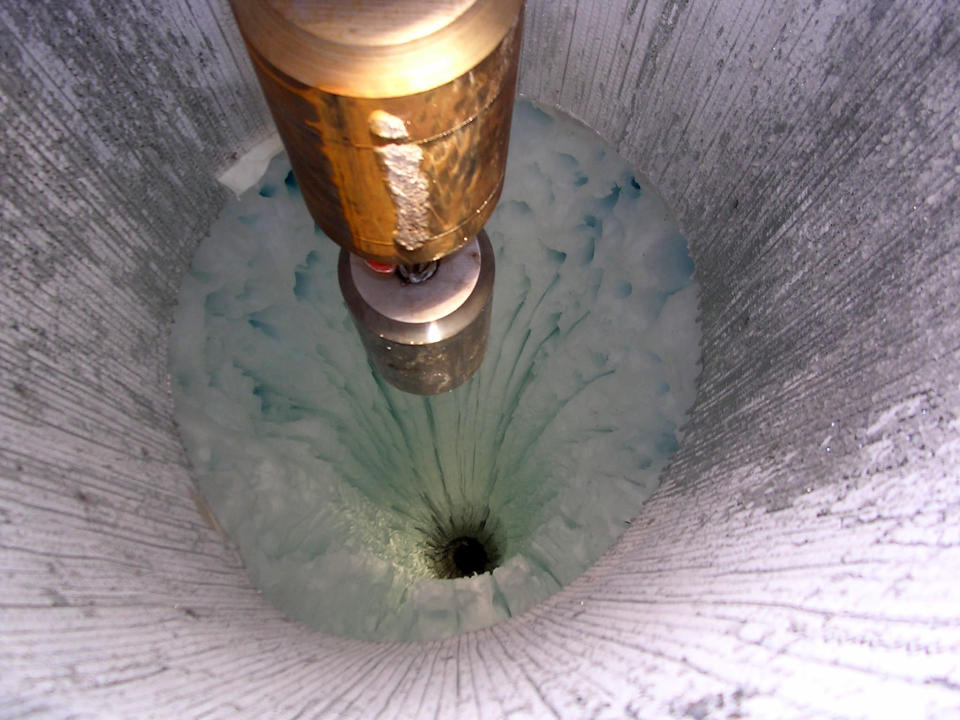<p>In Antarctica, the IceCube Neutrino Observatory waits for the passage of neutrinos. Already, it's found dozens, some from outside our solar system. 86 holes just like this one were dug, each about 1.5 miles deep. Neutrino detectors were placed at the bottom of each hole—the detectors need to be buried that deep to prevent interference from other particles passing through. Operating since 2010 after five years of construction that could only happen during the Antarctic summer, the facility has already expanded our understanding of the ghostly neutrino particles.</p>