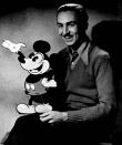 FILE PHOTO: Walt Disney is pictured with his famous character Mickey Mouse in this undated file photograph