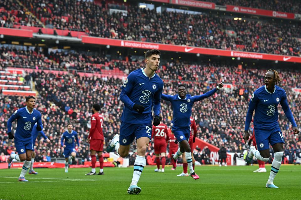 Chelsea's German midfielder Kai Havertz (C) celebrates after scoring his team first goal that will be disallowed for an offside position during the English Premier League football match between Liverpool and Chelsea at Anfield in Liverpool, north west England on January 21, 2023. - - RESTRICTED TO EDITORIAL USE. No use with unauthorized audio, video, data, fixture lists, club/league logos or 'live' services. Online in-match use limited to 120 images. An additional 40 images may be used in extra time. No video emulation. Social media in-match use limited to 120 images. An additional 40 images may be used in extra time. No use in betting publications, games or single club/league/player publications. (Photo by Paul ELLIS / AFP) / RESTRICTED TO EDITORIAL USE. No use with unauthorized audio, video, data, fixture lists, club/league logos or 'live' services. Online in-match use limited to 120 images. An additional 40 images may be used in extra time. No video emulation. Social media in-match use limited to 120 images. An additional 40 images may be used in extra time. No use in betting publications, games or single club/league/player publications. / RESTRICTED TO EDITORIAL USE. No use with unauthorized audio, video, data, fixture lists, club/league logos or 'live' services. Online in-match use limited to 120 images. An additional 40 images may be used in extra time. No video emulation. Social media in-match use limited to 120 images. An additional 40 images may be used in extra time. No use in betting publications, games or single club/league/player publications. (Photo by PAUL ELLIS/AFP via Getty Images)