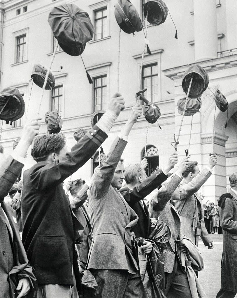 prince harald cheering with fellow students