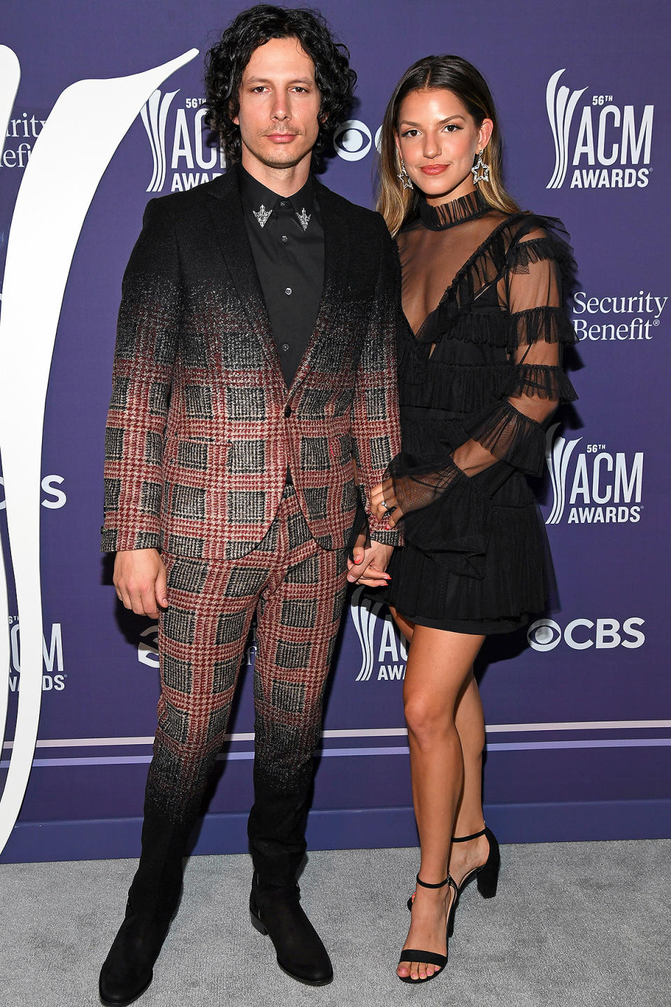 <p>The singers — who wed outside Nashville in late 2019 — brought the bold to the red carpet. </p>