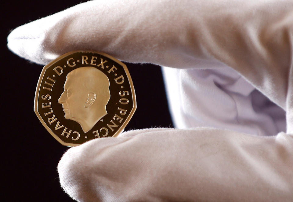 Coin effigy of Britain’s King Charles III is seen on a 50 pence coin, unveiled by The Royal Mint