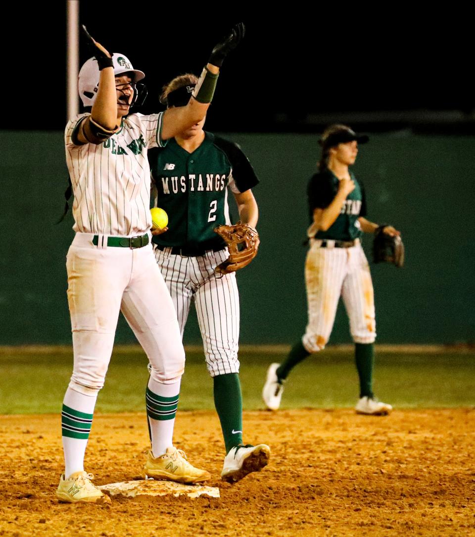 Julia Knowler, Fort Myers, celebrates after hitting a double. Lakewood Ranch scored big against Fort Myers to win 13-0 in the fifth, during their Monday night matchup. 