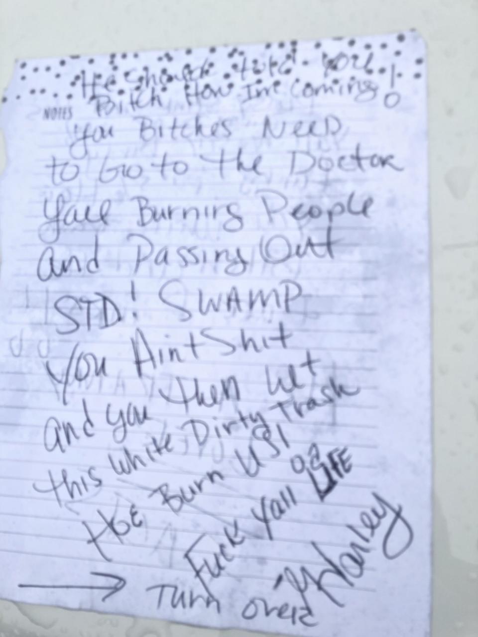 A note left on the smashed windshield of a New Orleans musician’s car. (Photo: Will Murry)